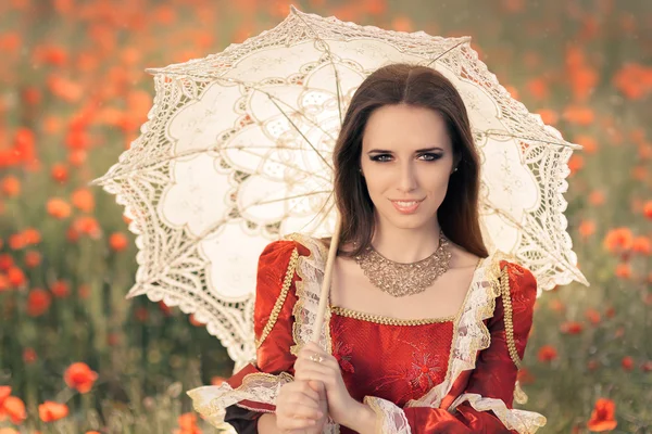 Όμορφη πριγκίπισσα με ομπρέλα στο καλοκαιρινό Floral τοπίο — Φωτογραφία Αρχείου
