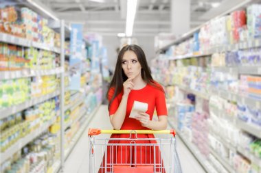 Curious Woman in The Supermarket with Shopping List
