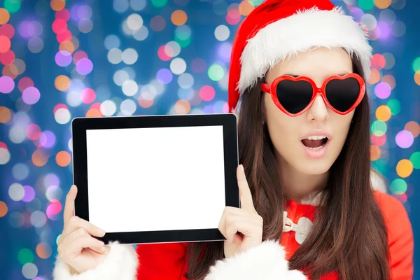 Překvapený vánoční dívka srdce sluneční brýle a Tablet — Stock fotografie