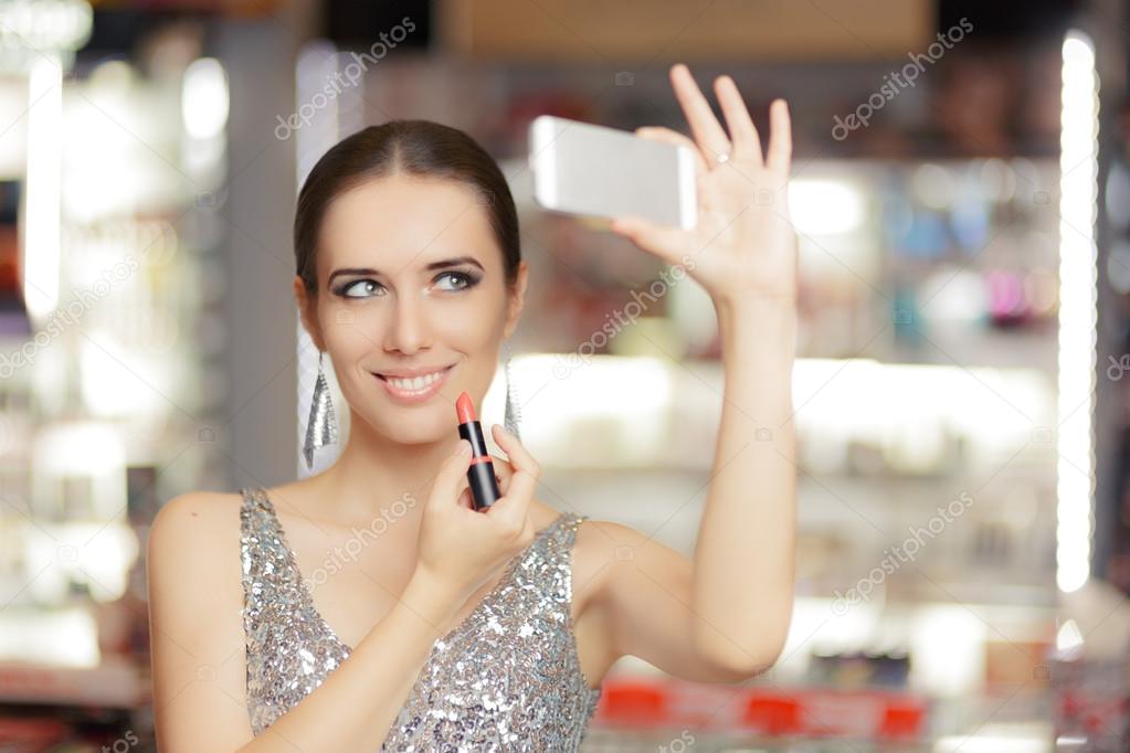 Glamour Woman with Lipstick and Smartphone