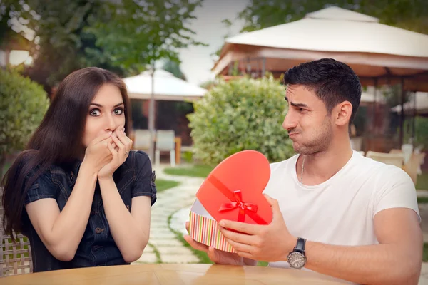 Happy Girl Receiving Heart Shaped Gift from her Boyfriend — Stock Photo, Image