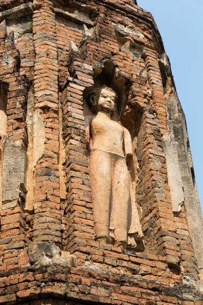 Buddha sculpture on ancient buddhism pagoda monument — Stock Photo, Image