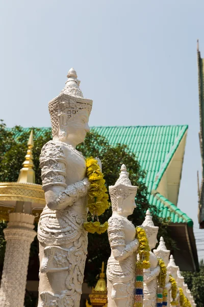 Angel sculpture statue in asian temple — Stock Photo, Image