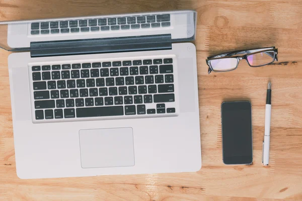 pen, mobile phone, glasses and computer notebook