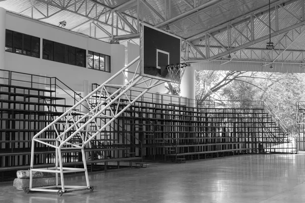 indoor basketball court field and grandstand, black and white
