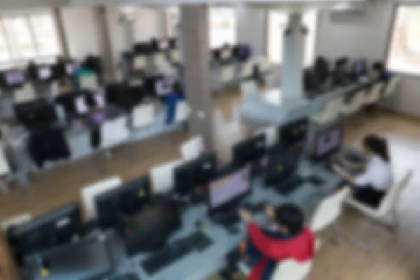 Student use computer to access to internet for education (blurry — Stock Photo, Image