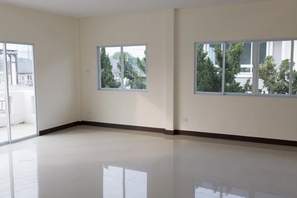 Room with sliding window and beige tile floor — Stock Photo, Image