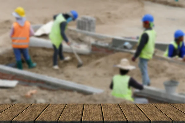 Arbeiter arbeiten auf der Baustelle — Stockfoto