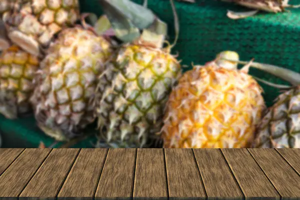 Pineapple on shelf for sale — Stock Photo, Image