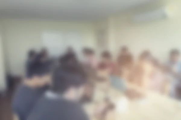 Persone con taccuino in sala riunioni per sfondo, sfocatura e vi — Foto Stock