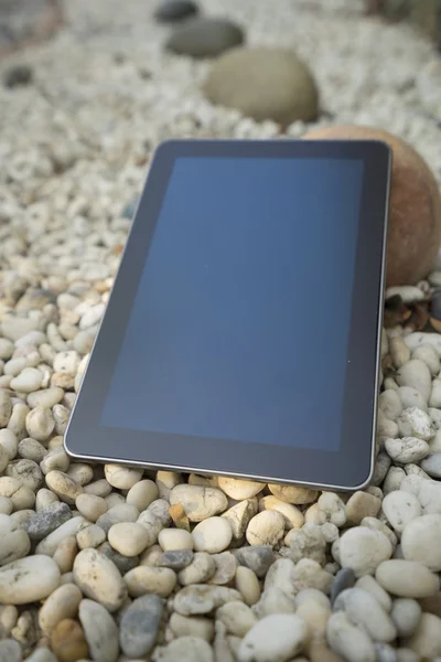 digital tablet on stone