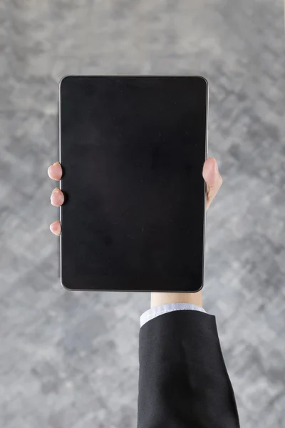 Businessman hand holding digital tablet — Stock Photo, Image