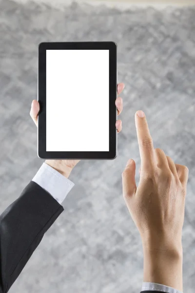 Businessman hand holding digital tablet with finger pointing — Stock Photo, Image