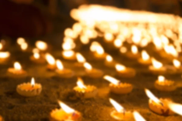 Blur image of candle light glowing at night — Stock Photo, Image