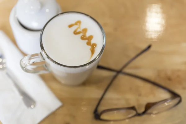 Hot cappuccino coffee drink with sugar mug — Stock Photo, Image