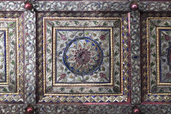 sculpture on buddhism temple ceiling