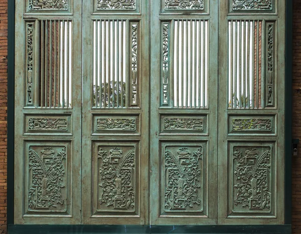 Wooden carved blue door — Stock Photo, Image