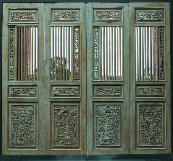 Wooden carved blue door — Stock Photo, Image