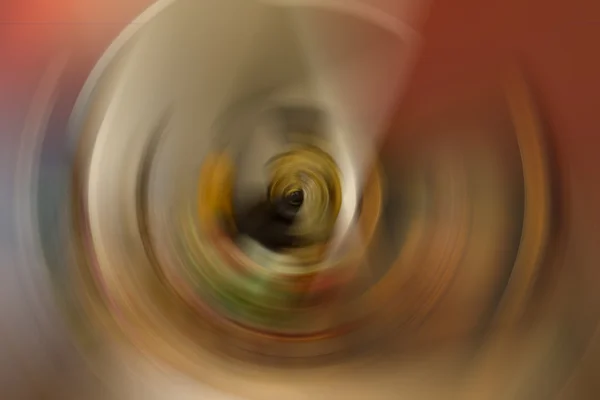 Das radial verschwommene Bild von roter und gelber Farbabstinenz — Stockfoto