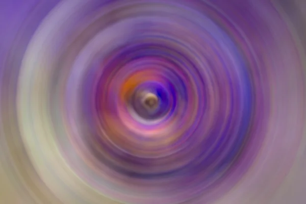 Das radial verschwommene Bild der violetten und gelben Farbe abstrakt — Stockfoto