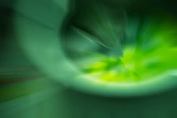 Green and black color radial motion blur abstract — Stock Photo, Image