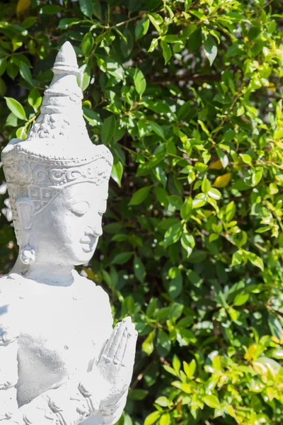 Asian angel sculpture wearing jewelry — Stock Photo, Image