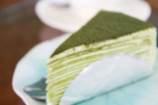 Imagen borrosa de pastel de crepe de té verde — Foto de Stock