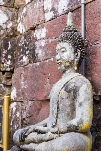 Old buddha statue in antique stone castle — Stock Photo, Image