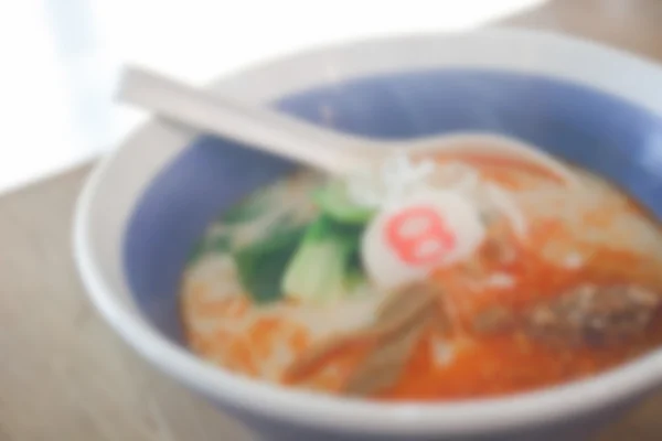 Blurry defocused spicy japanese noodle with pork and sesame for — Stock Photo, Image
