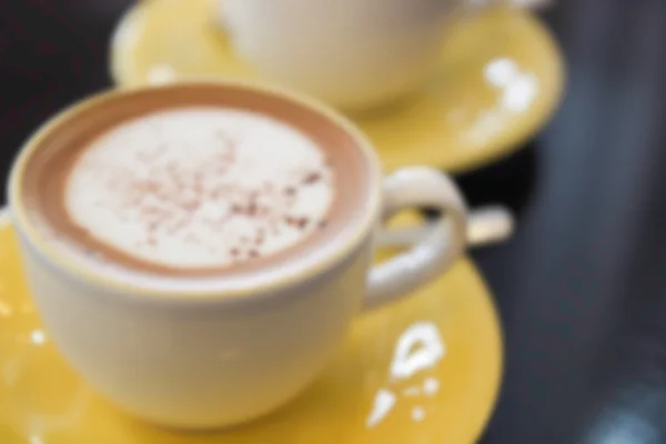 Suddiga defocused varm cappuccino kaffe för bakgrund — Stockfoto