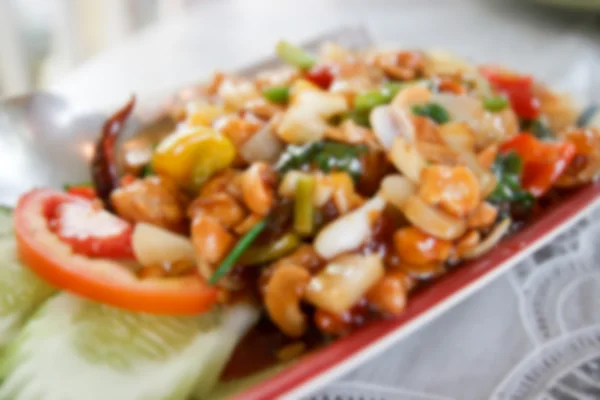 Blurry defocused image of fried chicken stir fry with cashew nut — Stock Photo, Image