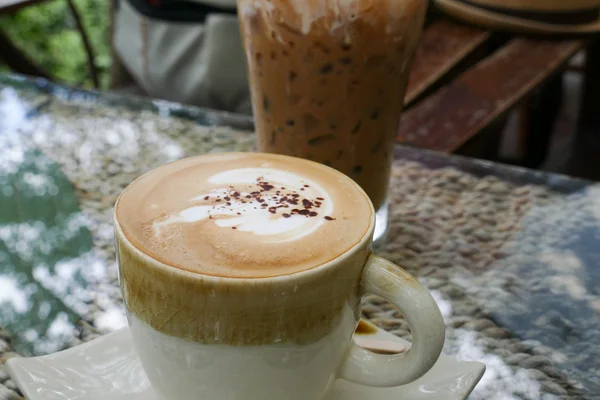 Hot cappuccino coffee drink with latte art — Stock Photo, Image