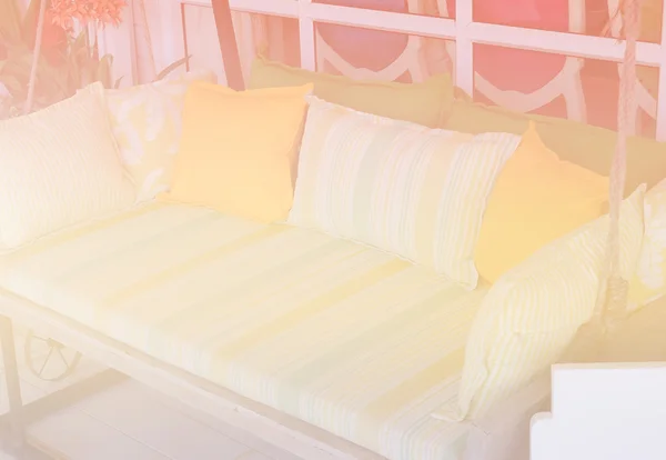 Fabric sofa on terrace with color filter and soft focus — Stock Photo, Image