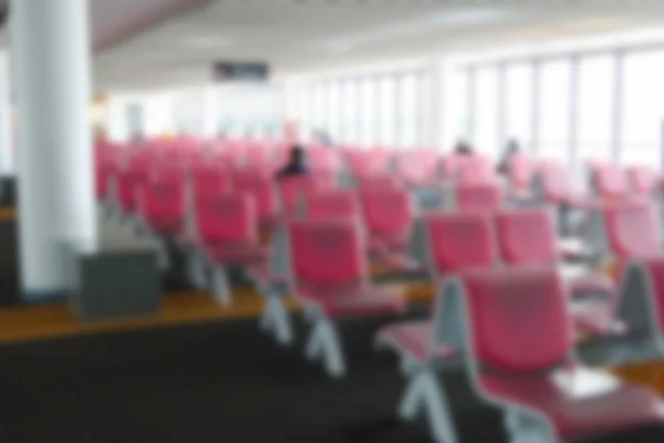 模糊的离焦图像的乘客在机场航站楼 — 图库照片