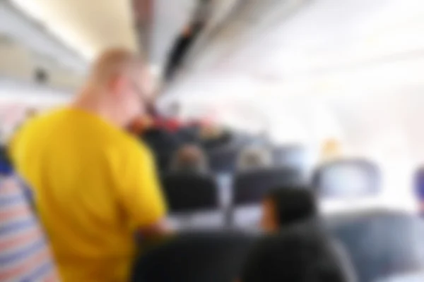 Imagem turva desfocada do passageiro no avião — Fotografia de Stock