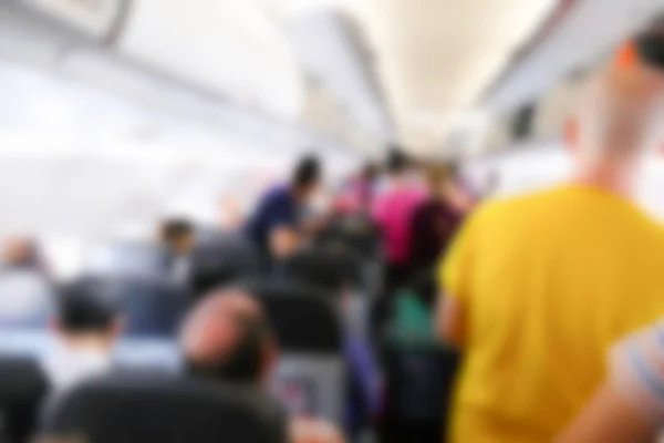 Intreepupil wazig beeld van de passagier in het vliegtuig — Stockfoto