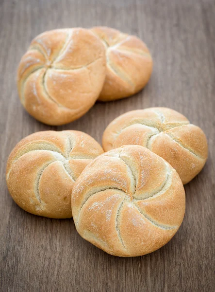 Homemade fresh bread buns  on old wooden table, selective focus — Stock Photo, Image