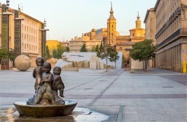 Square of Pilar in Zaragoza with the church of San Juan de los P clipart