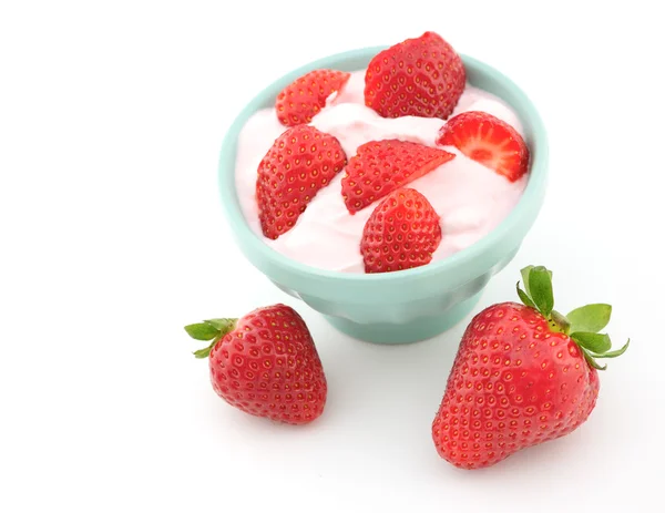 Fresh strawberry with yogurt in a glass isolated on white Stock Photo