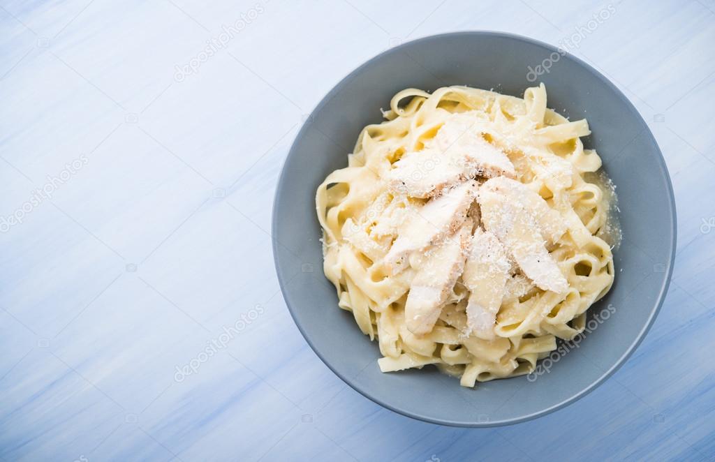 Pasta fettuccine alfredo with chicken and parmesan