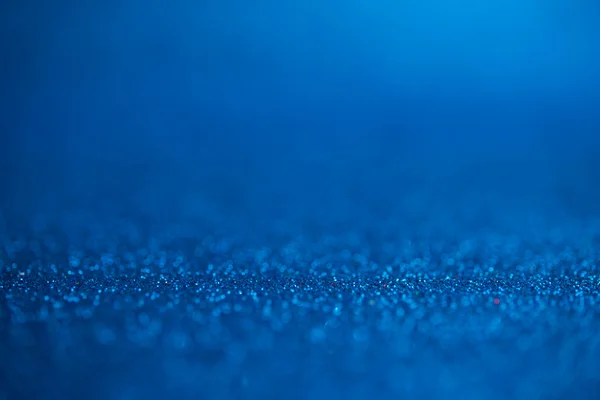 Abstract dark blue glitter bokeh holiday background. Winter xmas holidays. Christmas. — Stock Photo, Image