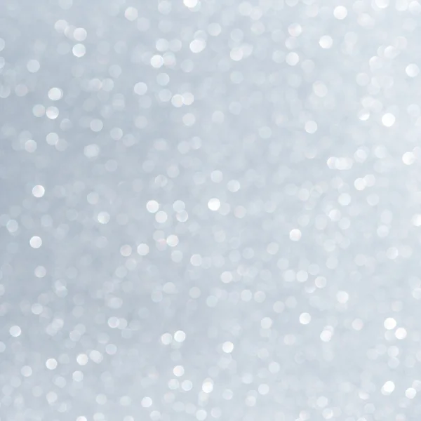 Latar belakang liburan glitter putih abstrak yang tidak terfokus — Stok Foto