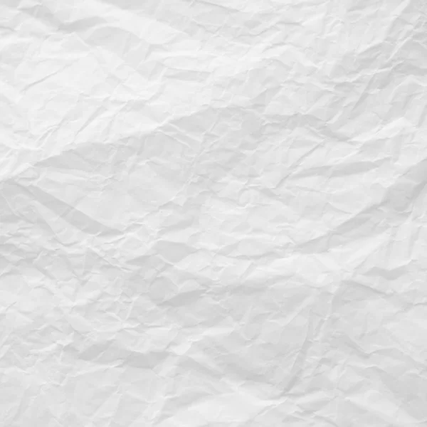 Zmačkaný bílý papír textury pozadí — Stock fotografie