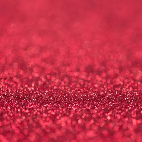 Unfocused abstract red glitter holiday background — Stock Photo, Image