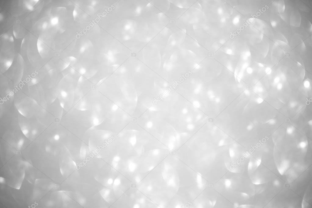 Unfocused abstract silver glitter holiday background