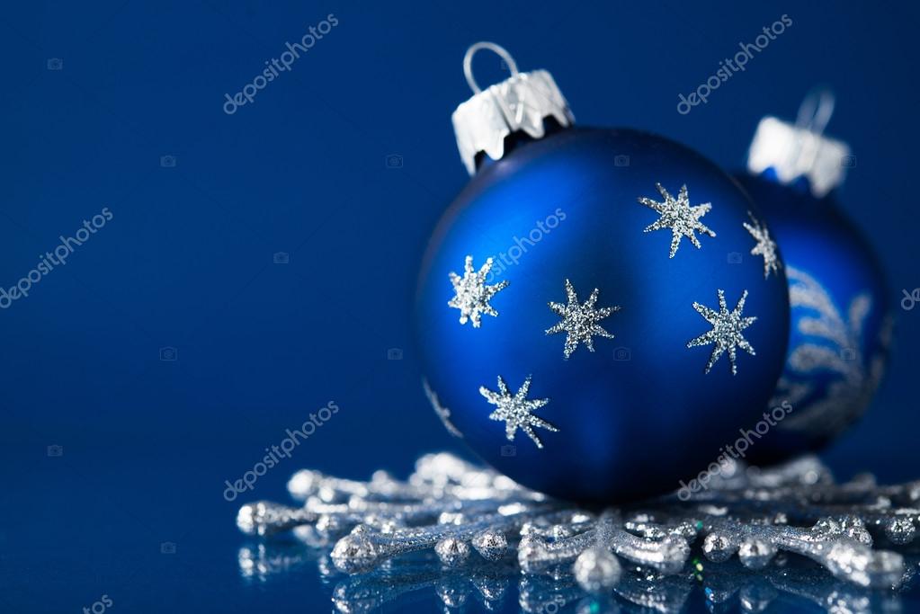 Blue and silver christmas ornaments on dark blue xmas background with space  for text Stock Photo by ©elenadesigner 55881521