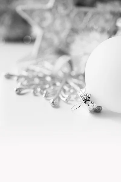 White xmas ornaments on white background with space for text — Stock Photo, Image