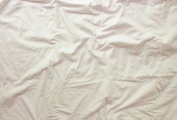 Płaski układ biały tło. Nowoczesne minimalne tło z teksturą tkaniny i fałdami bawełnianej tkaniny. Widok z góry — Zdjęcie stockowe
