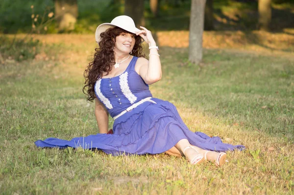 Outdoor portrait of the middle age woman. — Stock Photo, Image