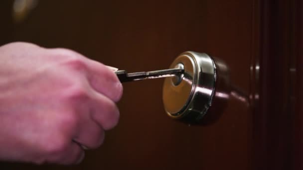 Female Hand Inserting Turning Key Unlock Lock — Stock Video